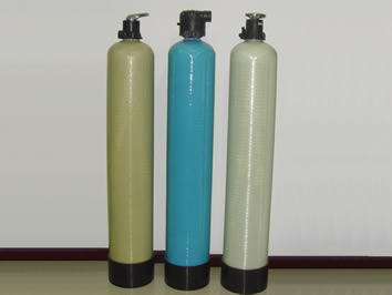 Three standard FRP tanks, the first is grey, the second is blue, the third is natural color.
