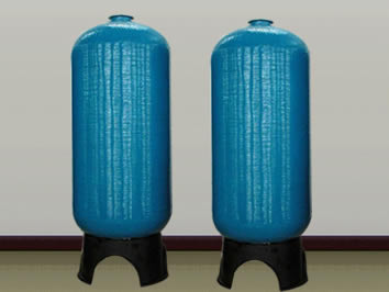 Two blue FRP tanks with tripod base is on the ground.
